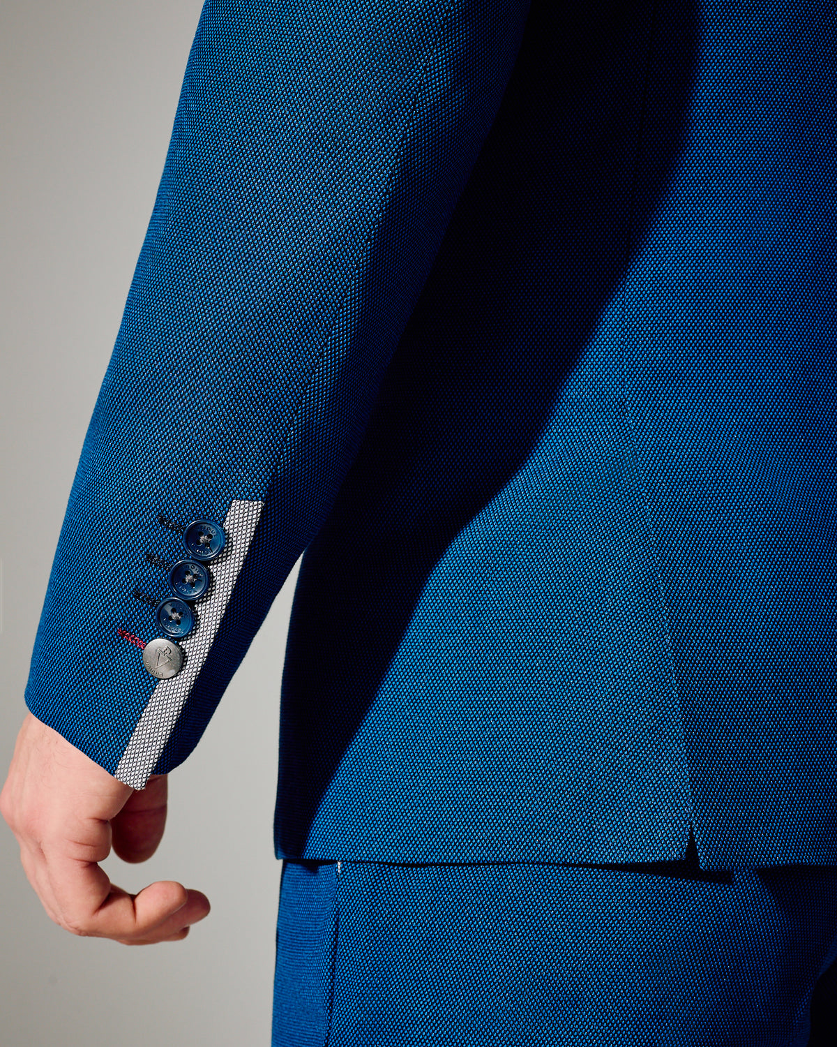 close tailored fit blue textured suit- ocean wave blue