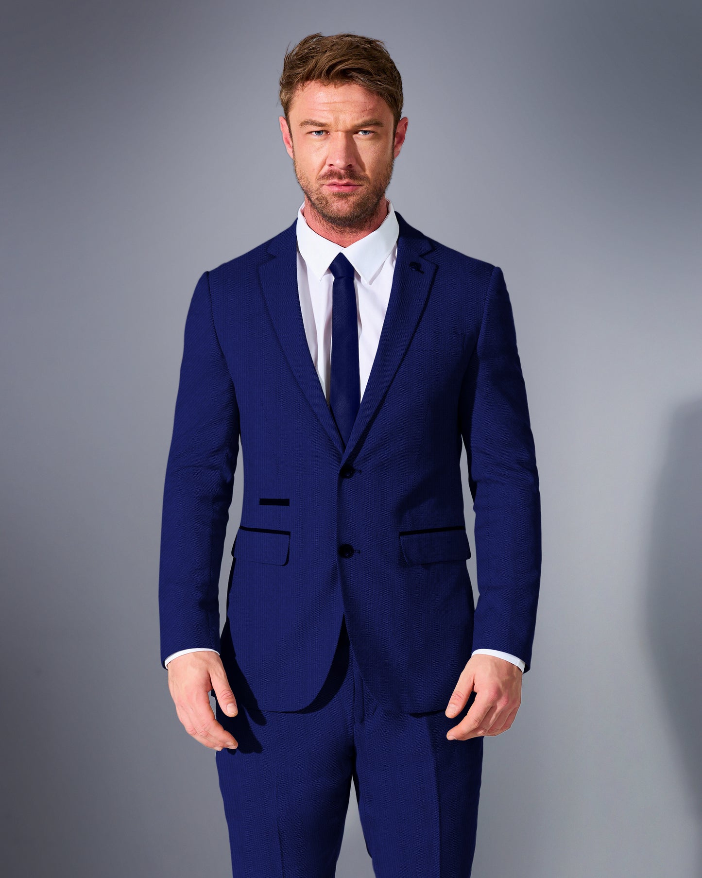 close tailored fit blue textured suit- electric blue