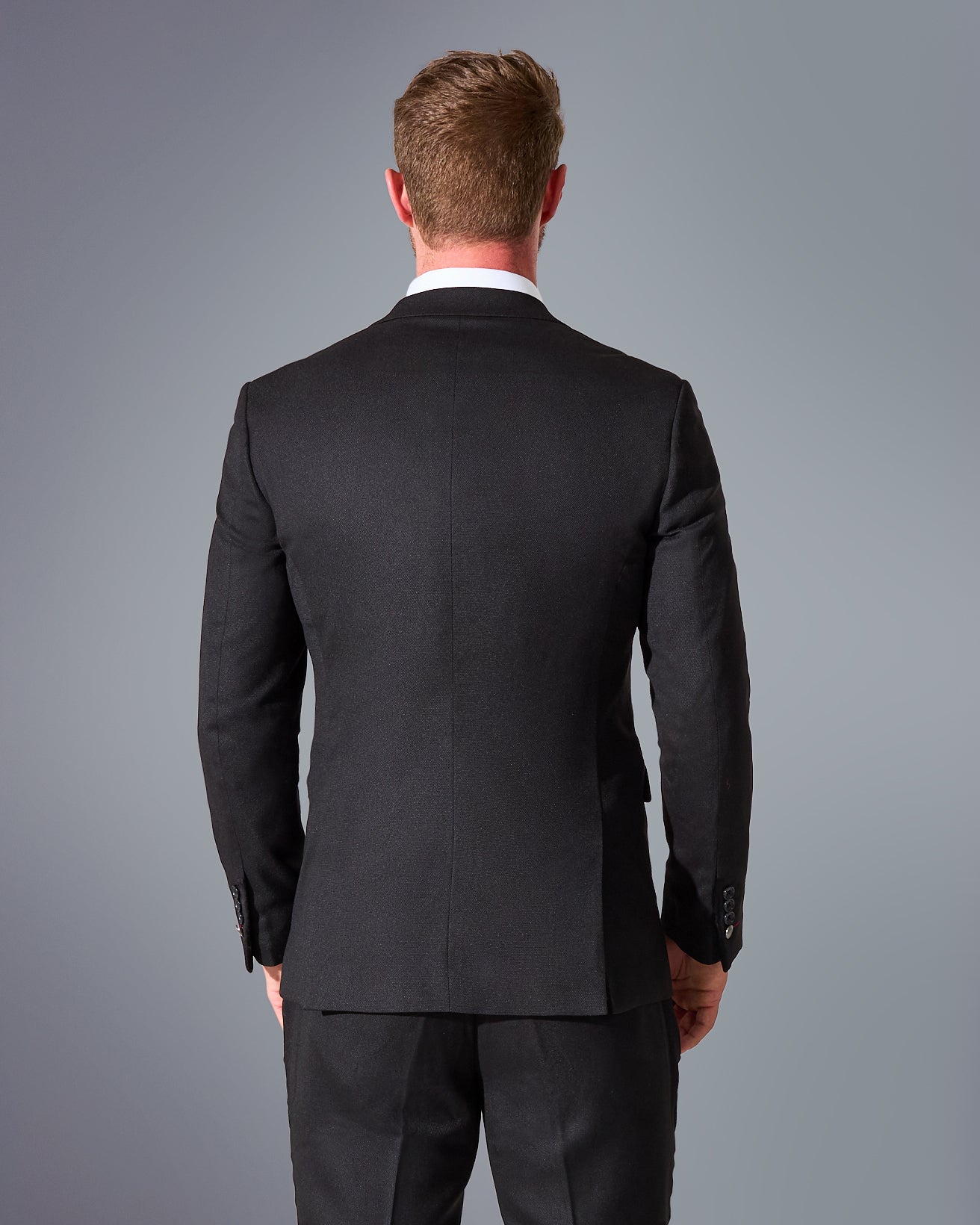 close tailored fit black textured suit- midnight black