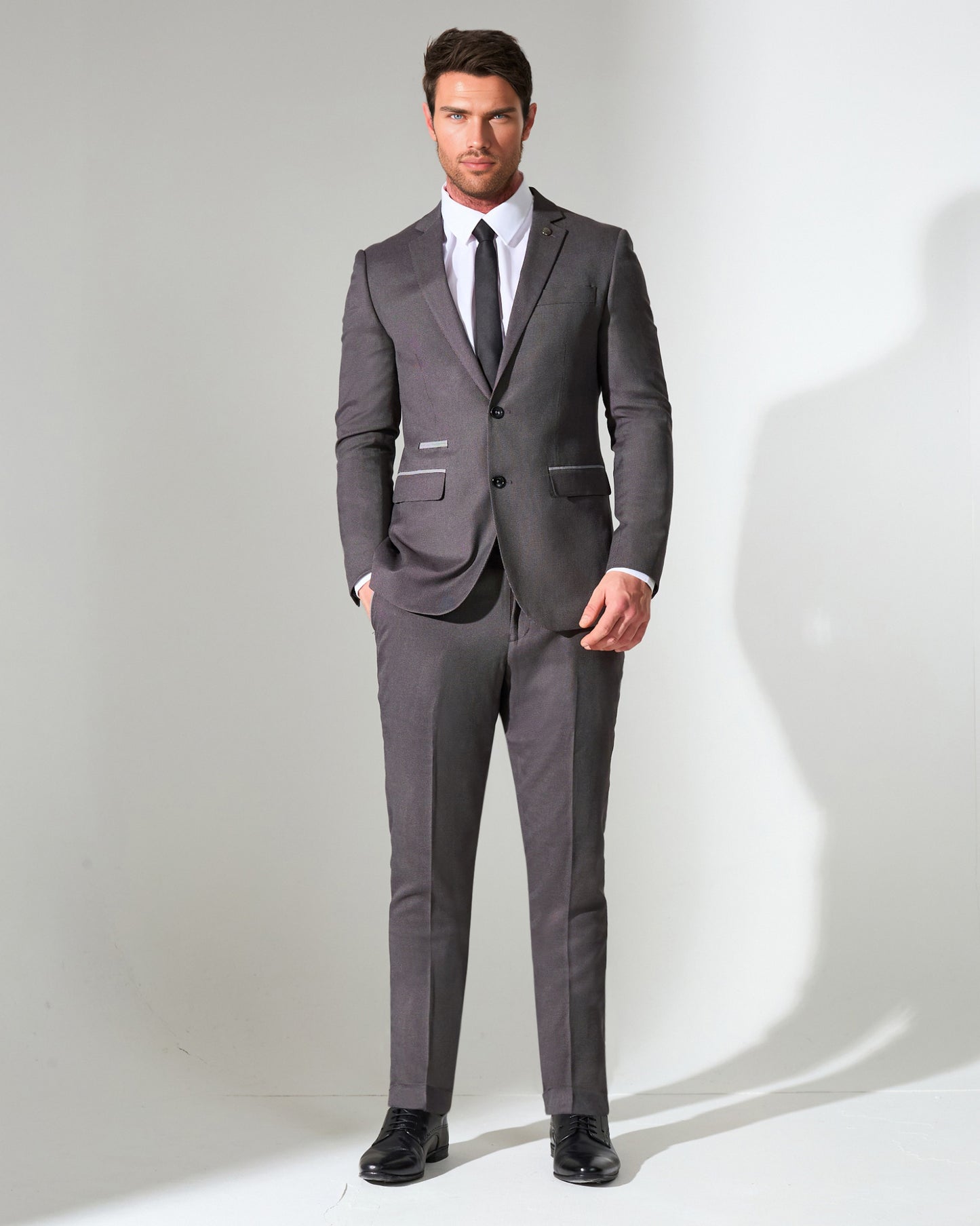 close tailored fit dark grey textured suit- hilltop rock grey